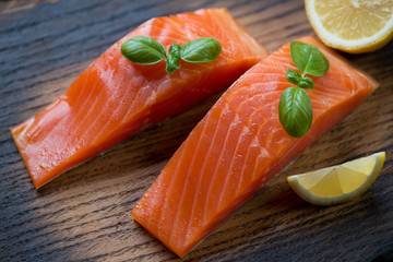 Close-up of sliced smoked trout fillet, selective focus