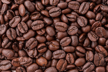 Big roasted coffee beans texture close up