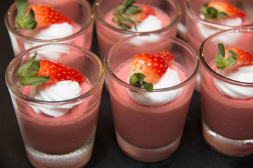  strawberry  panacotta cream dessert on the table