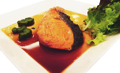 Grilled Salmon steak with Soy Sauce on white background, Close u