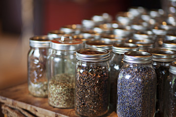Jars with dried herbs and spices