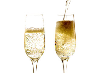 Two glass of champagne wine close up, bubbles, fizz, isolated on white background