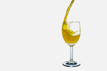 White wine splash into glass