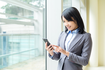 Businesswoman use of cellphone