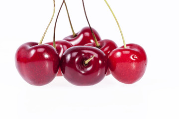 some fruits of red cherry isolated on white background
