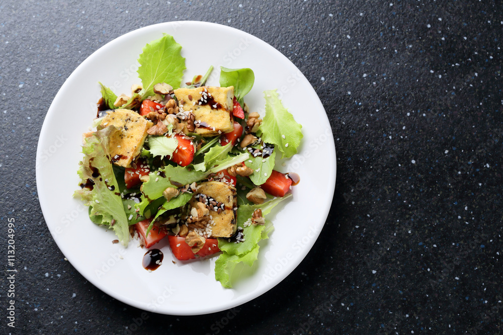 Wall mural vegan salad with roasted tofu