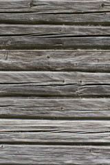 Fototapeta premium vertical fragment of an old wooden wall