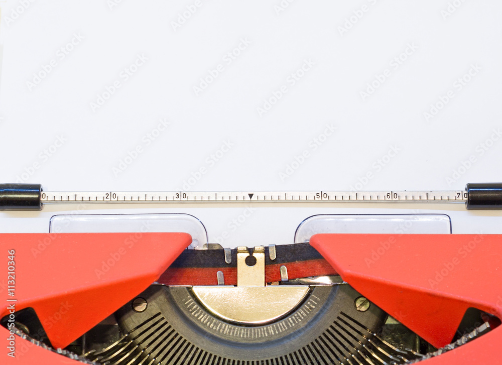 Fototapete close up image of red typewriter with paper sheet. copy space for your text.