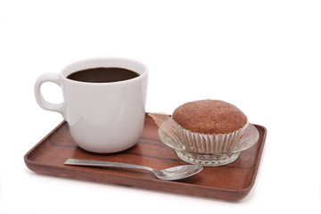 Coffee cup and banana muffin cake on wooden tray isolated on white background