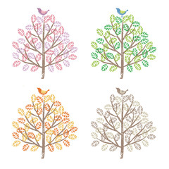 Obraz premium 春、夏、秋、冬 季節で違う色合いの木と鳥