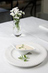 Tasty Bechamel sauce or white, with fresh greenery