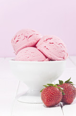 Strawberry ice cream and strawberries.