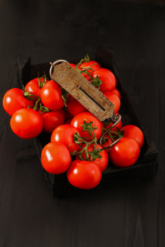 Top view of fresh tomatoes,  isolated on dark background