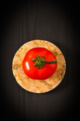 Top view of fresh tomatoes, isolated on dark background