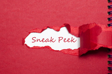 The word sneak peek appearing behind torn paper. - 113213176