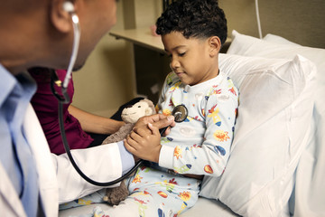 Doctor examine boy with stethoscope