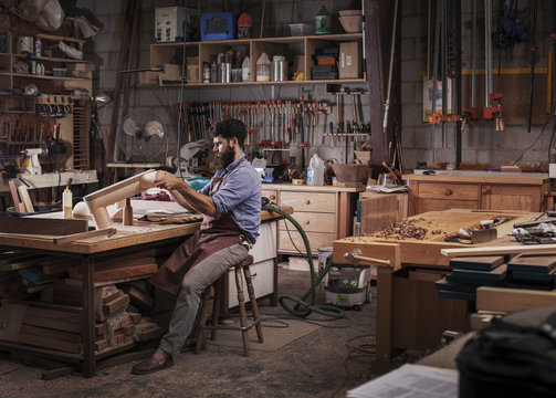 Carpenter working in workshop