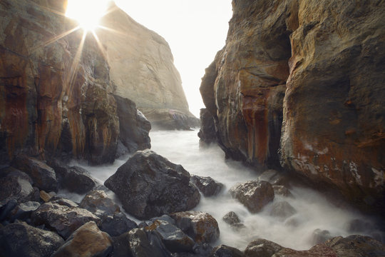 View of cliffs by sea