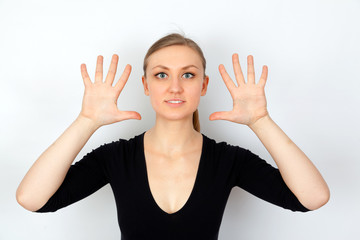 Attractive young woman showing her hands