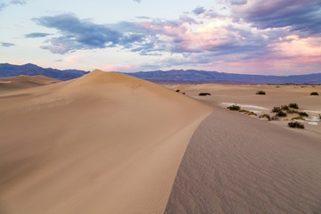 Obraz na płótnie Canvas Sunset at Mesquite Flat Sand Dunes in Death Valley National Park, California, USA