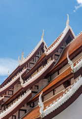 Fototapeta na wymiar Church roof in the traditional Thai style