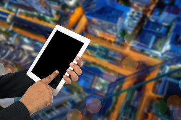 Businessman using tablet pc.