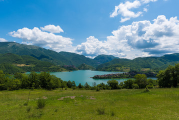 Fototapeta na wymiar Turano Lake (in italian Lago del Turano) is an awesome artificial lake in the Province of Rieti, Lazio, central Italy. At an elevation of 536 m, its surface area is 5.6 km2.