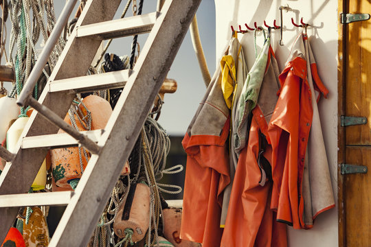 Waterproof jackets hanging on hook