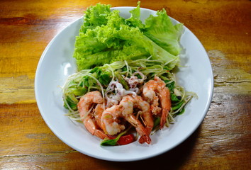 sunflower sprout with shrimp and squid spicy salad on dish