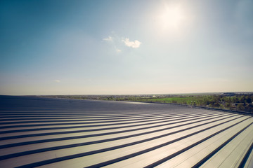 Metal panel building roof construction
