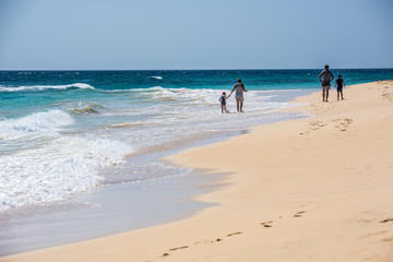 Family in vacation at the beach in Sal, Cape Verde, Africa