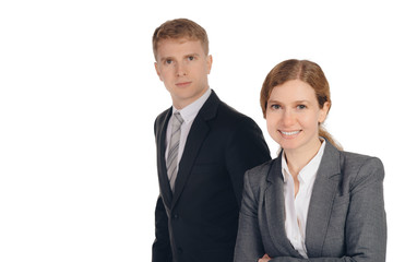 two persons in suits standing