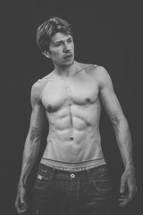 Fototapeta premium Portrait of a Muscular man in a studio