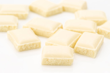 small pieces of white chocolate on white