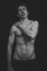 Fototapeta premium Portrait of a Muscular man in a studio