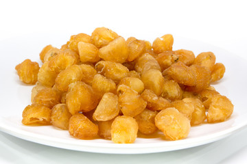 dried longan fruit on white background