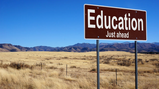 Education brown road sign