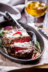 Healthy lean grilled medium-rare steak and vegetables