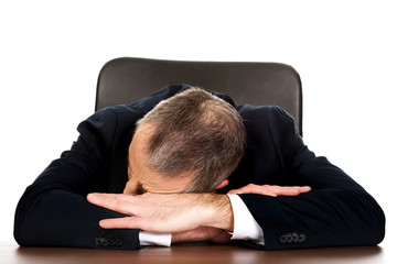 Businessman resting at his desk