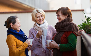 Mature women drinking tea