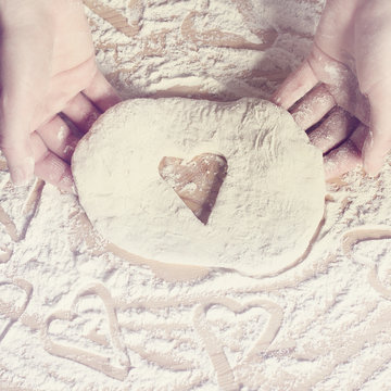 Cooking Favorite Dishes/ Chef Prepares A Special Dish Made From Pastry With Heart Shape 