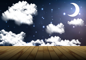 Naklejka na ściany i meble a wooden table on a background of the cloudy night sky