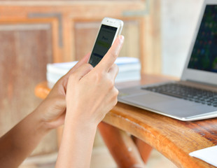 hand using phone