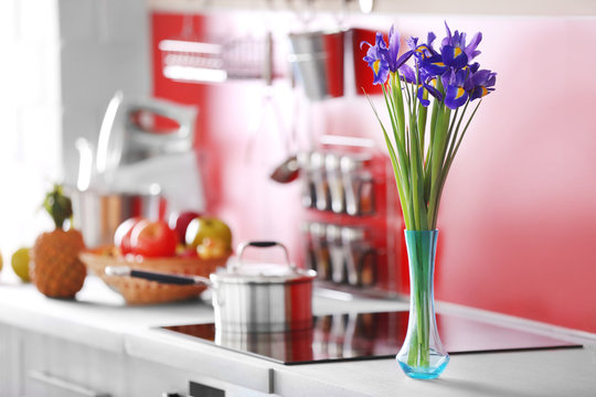 Bouquet of spring flowers in kitchen