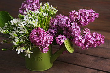 Beautiful fresh bouquet on wooden background