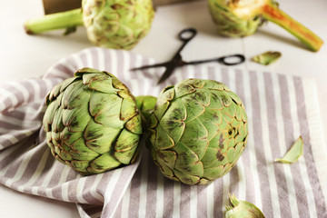 Fototapeta premium Artichokes on light background