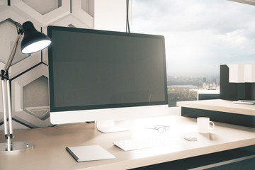 Designer workplace with computer monitor