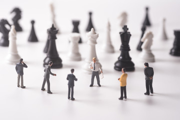business miniature team strategy training with chess background