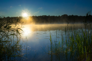 Sunrise over  Sawinda Wielka Lake. Masuria. Poland.