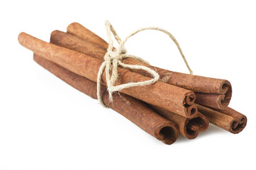 cinnamon stick spice close up on the white